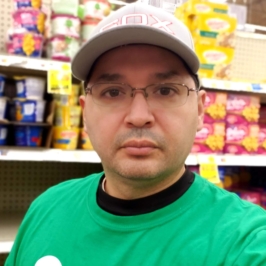 Portrait of Willy Solis in a grocery store