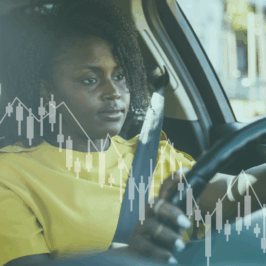 A Black woman driver wears a yellow blouse behind the wheel. The photo has a teal overlay and charts suggesteing surveillance.
